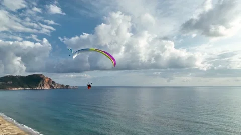 Aerial view 4 K parachute jumper flying over beautiful Alanya Stock Footage 224006808
