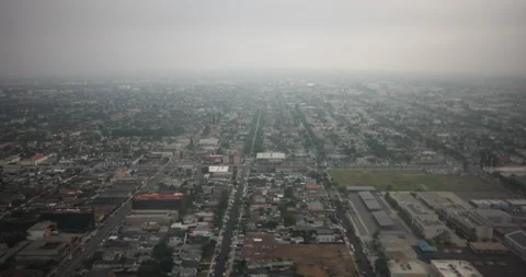 Aerial View of the 405 Freeway in Los Angeles Covered in Smog and Haze Stock Footage 329266925