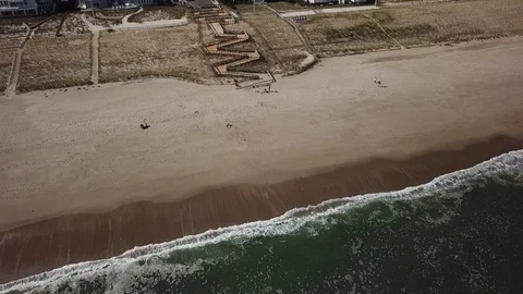 Aerial View 4K - Beach Path Crooked with Seagull - Revolving Approach Reveal Video stock 118002581
