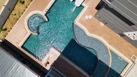 Aerial View 4K: Chic Waters - A New Era of Poolside Sophistication Stock Footage 293478608