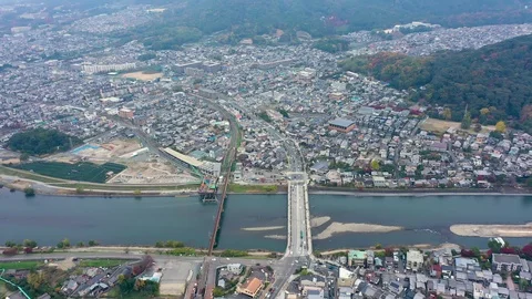 Aerial view 4k by drone of river in Uji City, Kyoto. Video stock 121361288