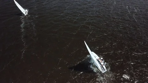 Aerial View 4K - E Scow Sailboat Race (BBYRA SS11) - Follow Stock Footage 113143157