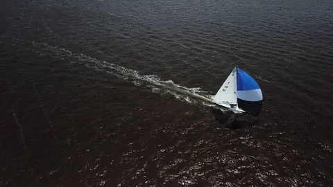 Aerial View 4K - E Scow Sailboat Race Downwind (BBYRA T18) - Rotate Stock Footage 113143406