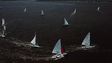 Aerial View 4K - E Scow Sailboats Racing and Rounding Mark (BBYRA) - Rotating Video stock 113143536