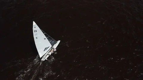 Aerial View 4K - E Scow Sailboat Hiking Upwind (BBYRA SS11) - Follow Stock Footage 113144054