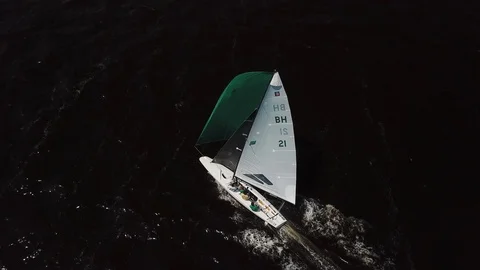 Aerial View 4K - E Scow Sailboat Downwind (BBYRA BH21) - Follow Lookdown Stock Footage 113144686