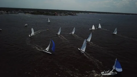 Aerial View 4K - E Scow Sailboats Round Windward Mark (BBYRA) - Approach/Rotate Video stock 113144792