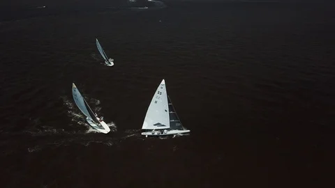 Aerial View 4K - E Scow Sailboat Racing on the Barnegat Bay (BBYRA) Stock Footage 113145391