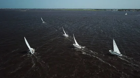 Aerial View 4K - E Scow Sailboats Racing on the Barnegat Bay (BBYRA) Stock Footage 113146193