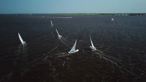Aerial View 4K - E Scow Sailboat Racing on the Barnegat Bay (BBYRA) Video stock 113146631