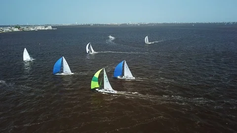 Aerial View 4K - E Scow Sailboats Rounding Leeward Mark (BBYRA) - Pan/Rotate Stock Footage 113146719