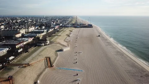 Aerial View 4K - Empty Beach and Casino Pier in Seaside Heights, NJ - Approach Video stock 114450415