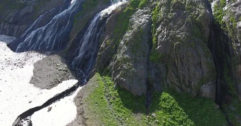 Aerial View. 4K flies over a beautiful waterfall and cliffs Stock Footage 73270136