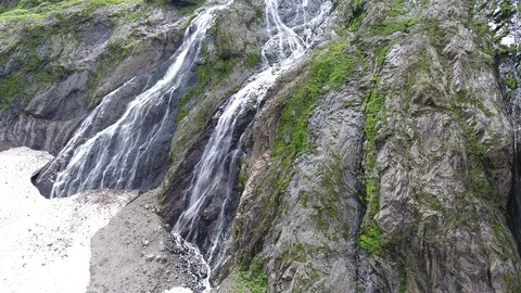 Aerial View. 4K flies over a beautiful waterfall and cliffs Stock Footage 73270201