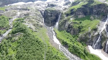 Aerial View. 4K flies over a beautiful waterfall and cliffs Stock Footage 85560074