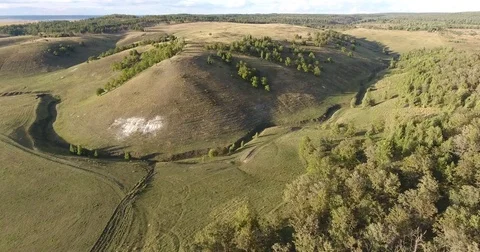 Aerial View. 4К Flight over the beautiful hills and forest Stock Footage 73872351