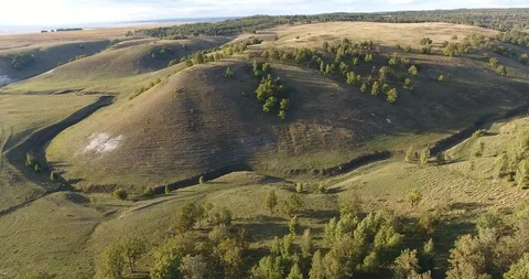 Aerial View. 4К Flight over the beautiful hills and forest Stock Footage 87166827