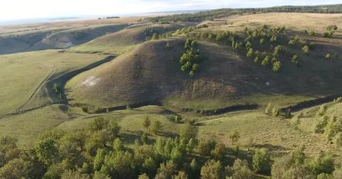 Aerial View. 4К Flight over the beautiful hills and forest Stock Photos