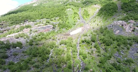 Aerial view .4K flying over the river to the mountains Stock Footage 73385750
