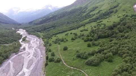 Aerial view .4K flying over the river to the mountains Stock Footage 73600620