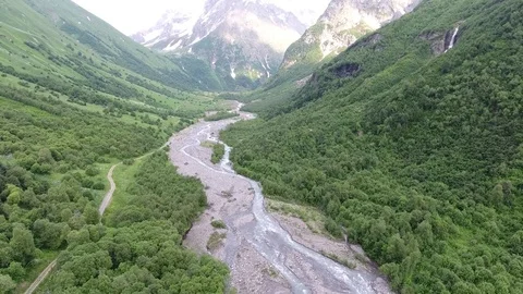 Aerial view .4K flying over the river to the mountains Stock Footage 73873022