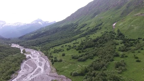 Aerial view .4K flying over the river to the mountains Stockbeeldmateriaal 73873106
