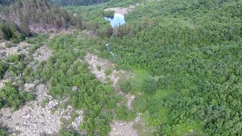 Aerial view. 4K flying over the mountain lake Stockbeeldmateriaal 73904508