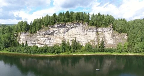 Aerial view. 4K flying over the river, forest and cliffs Stock Footage 73984526