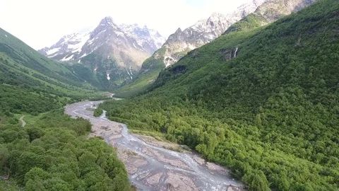 Aerial view .4K flying over the river to the mountains Stock Footage 73984714