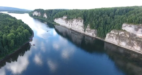 Aerial view. 4K flying over the river, forest and cliffs . The boat floats on Stockbeeldmateriaal 87166909