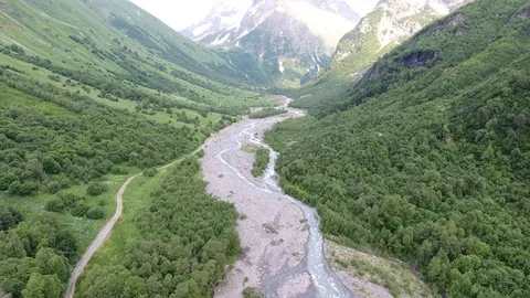 Aerial view .4K flying over the river to the mountains Stock Footage 87167376