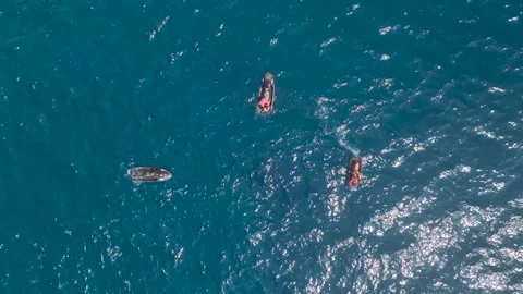 Aerial View 4K: Gliding on Aquatic Wings - Mediterranean Flyboarding Journey Stock Footage 293477764