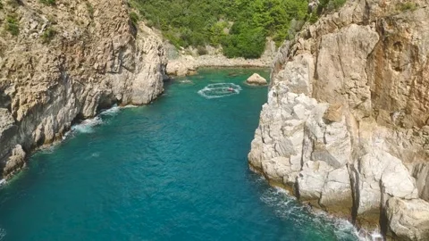 Aerial View 4K: Mediterranean Magic - Flyboarding Adventure with Luxury Yachts Stock Footage 293480669