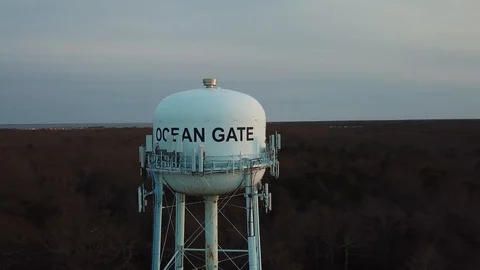 Aerial View 4K - Ocean Gate Water Tower - Backwards Revolve to Left Stock Footage 125839376