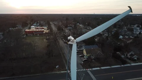 Aerial View 4K - Ocean Gate Broken Wind Turbine - Ascending Lookdown Stock Footage 125839804