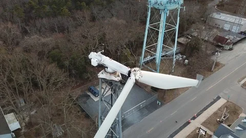 Aerial View 4K - Ocean Gate Defective Wind Turbines Closeup with Black Cat Stock Footage 125839902