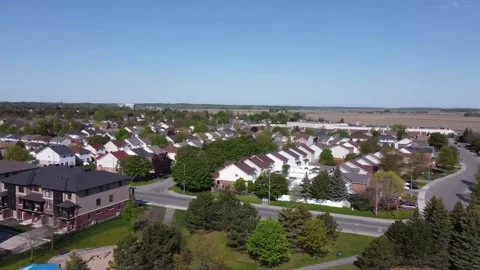 Aerial View 4K pan over  suburbs Stock Footage 154459675