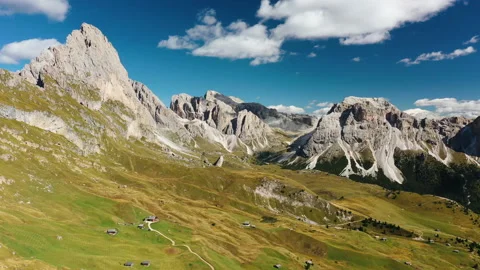 Aerial view in 4k seceda dolomite mountains on sunny day Stock Footage 213973106