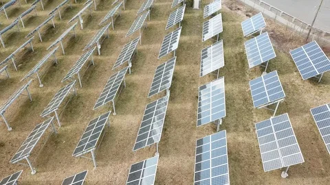 Aerial View 4K - Solar Panel Farm - Back to Front Rotate Stock Footage 124448080