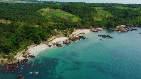 Aerial view 4K of steep cliffs on Bali beach Stock-Footage 289759371