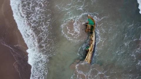 Aerial view 4K of steep cliffs on Bali beach Stock Footage 289759428