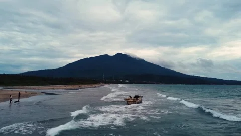 Aerial view 4K of steep cliffs on Bali beach Stock Footage 289759722