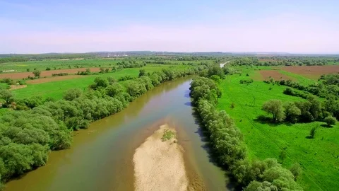Aerial View 4k. Take-off. Flying over the beautiful River. Aerial camera shot Stock Footage 77046509