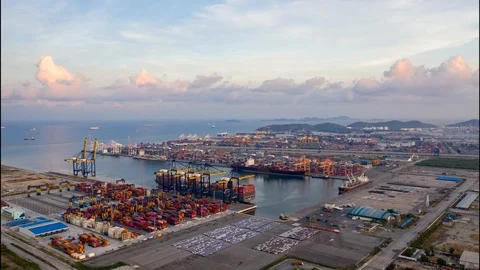 Aerial view. 4K Timelaspe. Container ship in pier with crane bridge carries out  Stock Footage 107093004