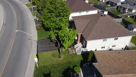 Aerial View 4K top down, tilt and pan  to suburbs Stock Footage 154459572