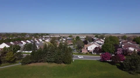 Aerial View 4K tracking over  suburbs Stock Footage 154459649