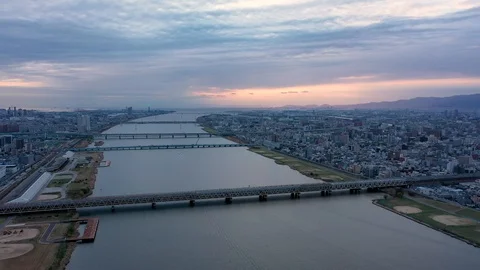 Aerial view 4k video by drone of River and building in Osaka city Stock Footage 121368331