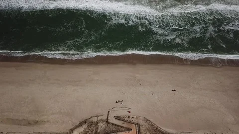 Aerial View 60fps - Beach Path Zigzag - Backwards Reveal Stock Footage 118002590