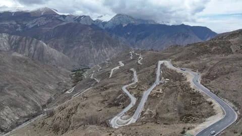 Aerial view of the 72 Turns of the Nujiang River in Basu County, Tibet on G318 Stock Footage 306856521