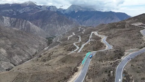 Aerial view of the 72 Turns of the Nujiang River in Basu County, Tibet on G318 Stock Footage 306856541